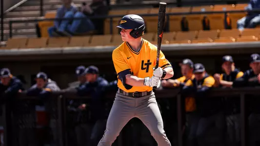 Carson McCaleb holds a bat waiting for a pitch