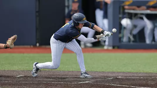Ryan Sudbrook lays down a bunt