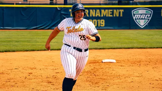 Jenna Bloomfield running the bases after hitting a home run at Scott Park.