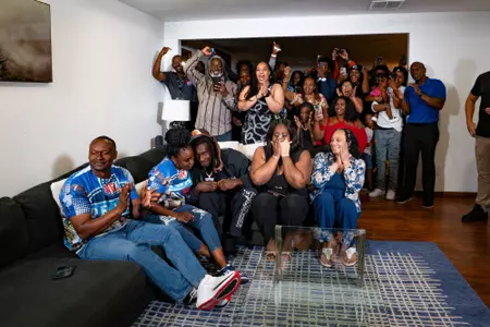 Emmanuel McNeil-Warren celebrates with family and friends on NFL Draft night