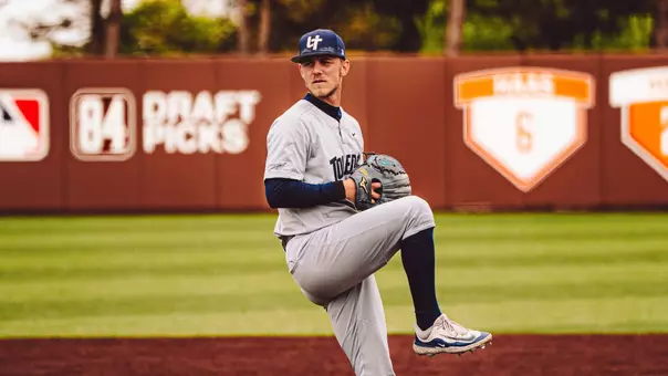 Deron Swanson throwing a pitch against Bowling Green