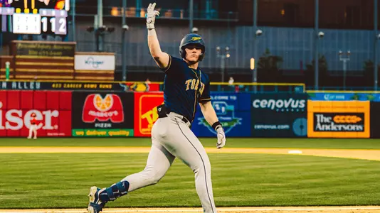 Ty O'Brien celebrates a home run against Bowling Green