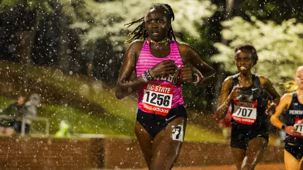Dorcas Kiptantui running in the rain at the 2026 Raleigh Relays.