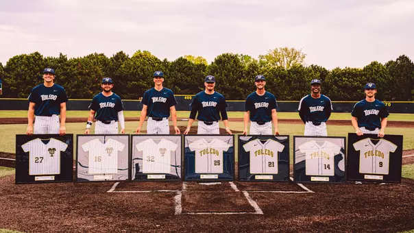 Seven Toledo baseball seniors pose for a photo