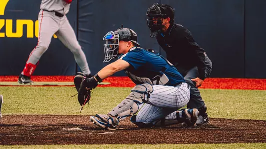 Jacob Payne in catching gear against Ball State