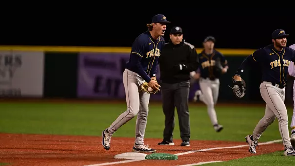 Michael Fliss celebrates getting out of an inning