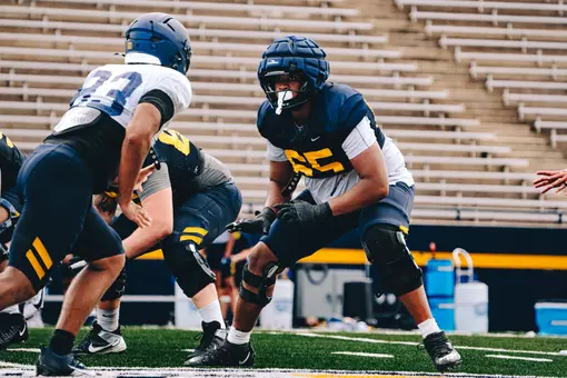 Stephen Gales blocking a teammate in practice