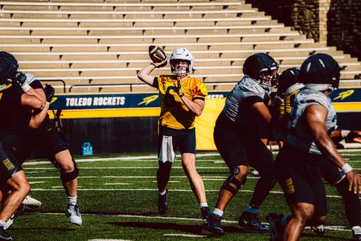 John Alan Richter throws a pass during fall camp