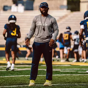 Toledo runing backs coach Fred Jones coaching during practice
