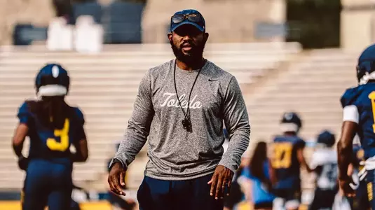 Toledo runing backs coach Fred Jones coaching during practice