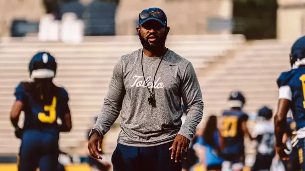 Toledo runing backs coach Fred Jones coaching during practice