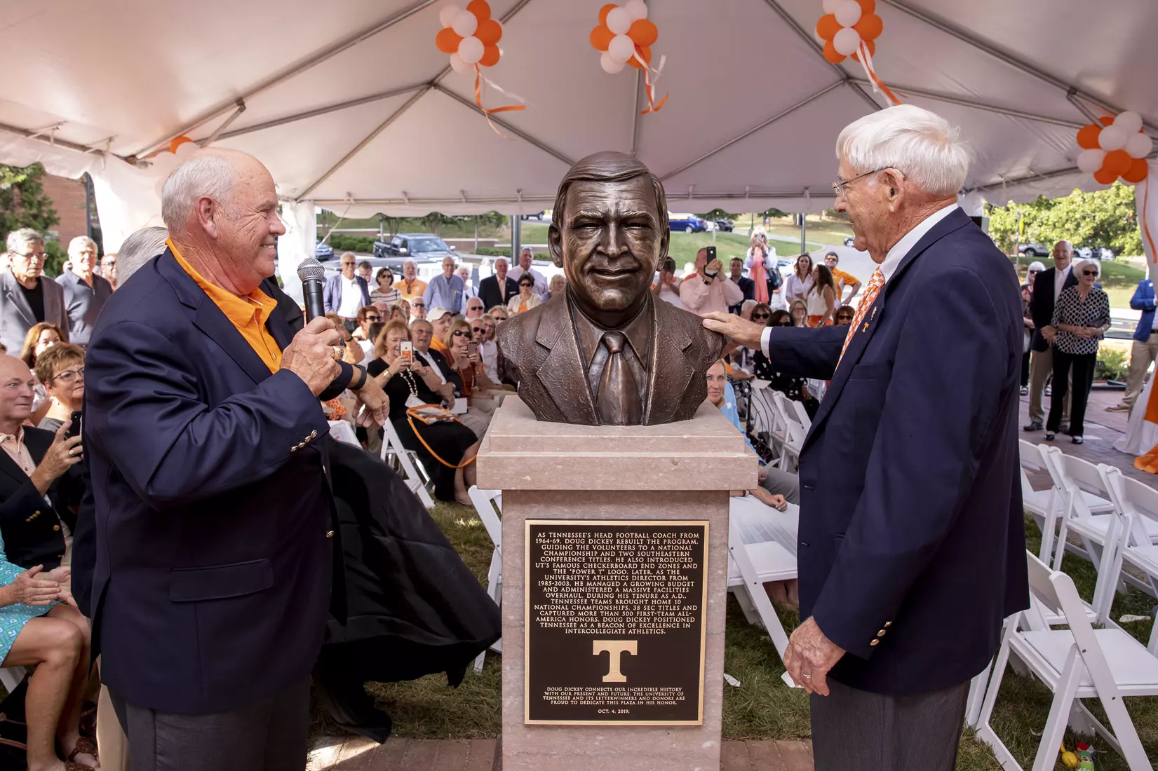 KNOXVILLE, TN - OCTOBER 04, 2019 - Director of Athletics Phillip Fulmer and Doug Dickey unveil a bust during the Doug Dickey Hall of Fame Plaza dedication in Knoxville, TN. Photo By Andrew Ferguson/Tennessee Athletics
