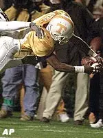 Travis Stephens dives into the end zone for a touchdown during the fourth quarter.