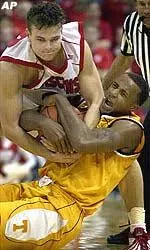Vincent Yarbrough fights for a loose ball during the first half.