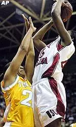 Tennesse's Loree Moore defends as South Carolina's Jocelyn Penn shoots for the basket in the secound half.