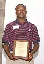 All-America Gary Kikaya