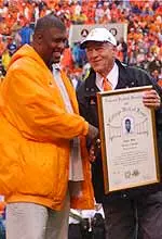 UT athletics director Doug Dickey welcomes Reggie White back to campus prior to this season's Tennessee-Florida game.