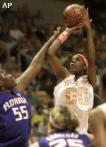 Michelle Snow shoots over Florida's Vanessa Hayden (55) during their game Thursday.