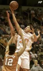 Kara Lawson shoots over Texas' Tai Dillard in Tuesday night's game.