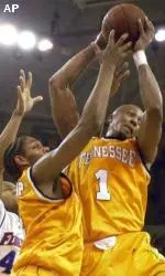 Tennessee's Vincent Yarbrough (1) comes down with a defensive rebound against Florida.