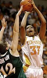 Ashley Robinson shoots over Notre Dame's Teresa Borton during the first half.