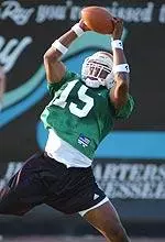 Preseason All-America receiver Kelley Washington makes a grab during today's opening workout.