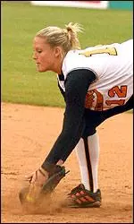 Amber Rhinehart scoops out a low throw