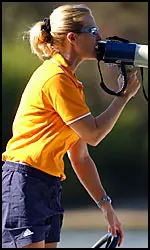 Coach Lisa Glenn calls out instructions during a practice this fall.
