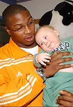 Parys Haralson visits with one of the children during the Vols' hospital visit in Atlanta.