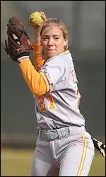 Mandie Fishback throws over to first base