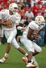 Erik Ainge hands off to Gerald Riggs Jr.