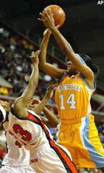 Alexis Hornbuckle takes a shot over Rutgers' Nikki Jett during the first half.