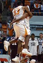 Brandon Crump and Jemere Hendrix celebrate UT's win over Mississippi State.