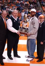 Athletics Director Mike Hamilton, Phillip Fulmer and team co-captain Jason Allen accept the SBC Cotton Bowl trophy from team selection chairman Dan Petty.