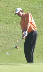 Ben Spickard chips at The Ridges.