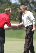 David Skinns shakes hands with Georgia's Richard Scott after claiming the individual title.