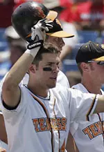 Tennessee's J. P. Arencibia, left, celebrates after hitting a home run against Arizona State in the first inning of a College World Series game in Omaha, Neb., Sunday, June 19, 2005.(AP Photo/Eric Francis)