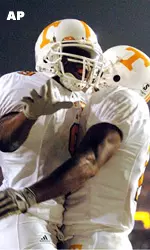 Bret Smith, left, is embraced by C.J. Fayton after Smith scored a touchdown against Florida in the scond quarter. (AP Photo/Phelan Ebenhack)