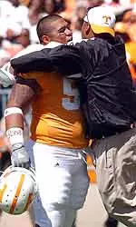 Jesse Mahelona and Coach Trooper Taylor