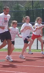 Matthew Lapp runs with South Doyle students.