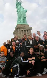Statue Of Liberty With Team Posing