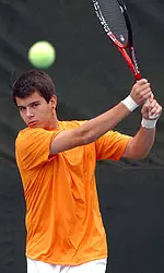 Conkic Competing In Tennis