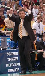 Bruce Pearl Holding Up Number 22