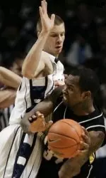 Penn State's Brandon Hassell, left, guards Iowa's Tyler Smith. (AP Photo/Carolyn Kaster)