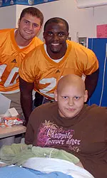 Football Athletes Comforting Patients