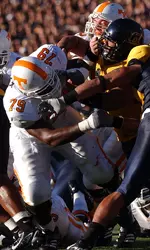 Chris Scott Competing In Football