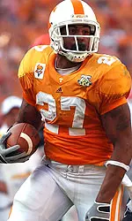 Foster Carrying Football