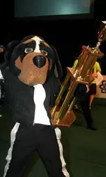 Mascot Smokey Holding Trophy