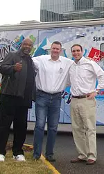 Three People Posing For Photo