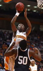 Chism Jumping With Basketball